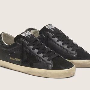 Women's Super-Star in black nappa with black star and glitter heel tab.